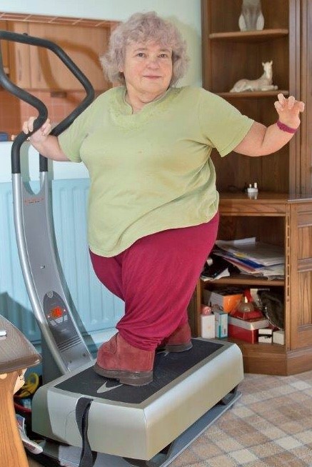 Kath West standing on her exercise machine