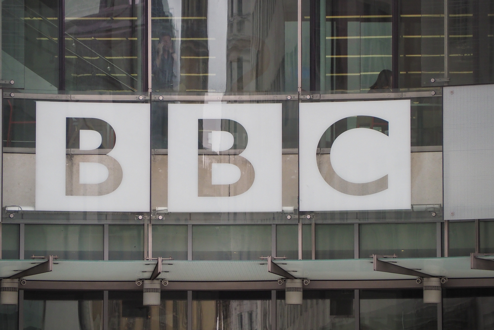 BBC logo in glass on the front of their headquarters in London