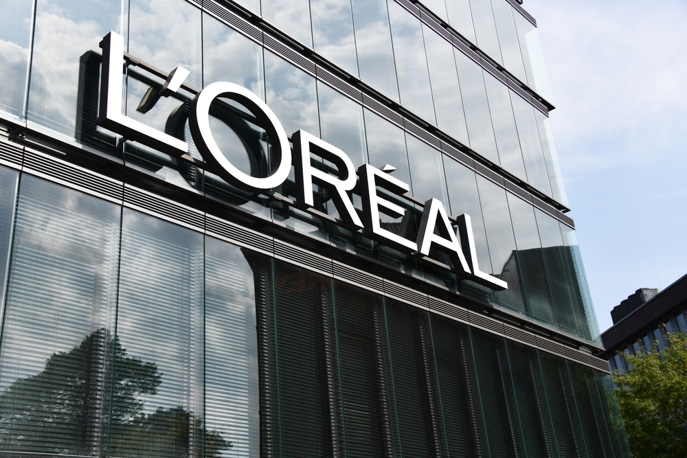 L'Oreal brand logo on glass wall of a building