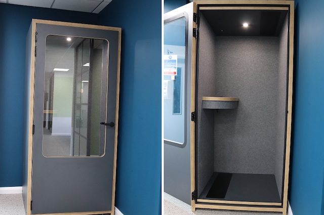 Wooden box with full height door, lined with sound proofing material to be used as a private phone booth for one person