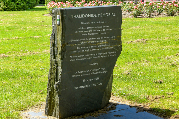Memorial stone in Alexandra Gardens, Cathays Park, Cardiff showing an inscription for people who were affected by the thalidomide drug