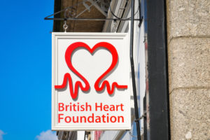 British Heart Foundation sign hanging on the side of a building